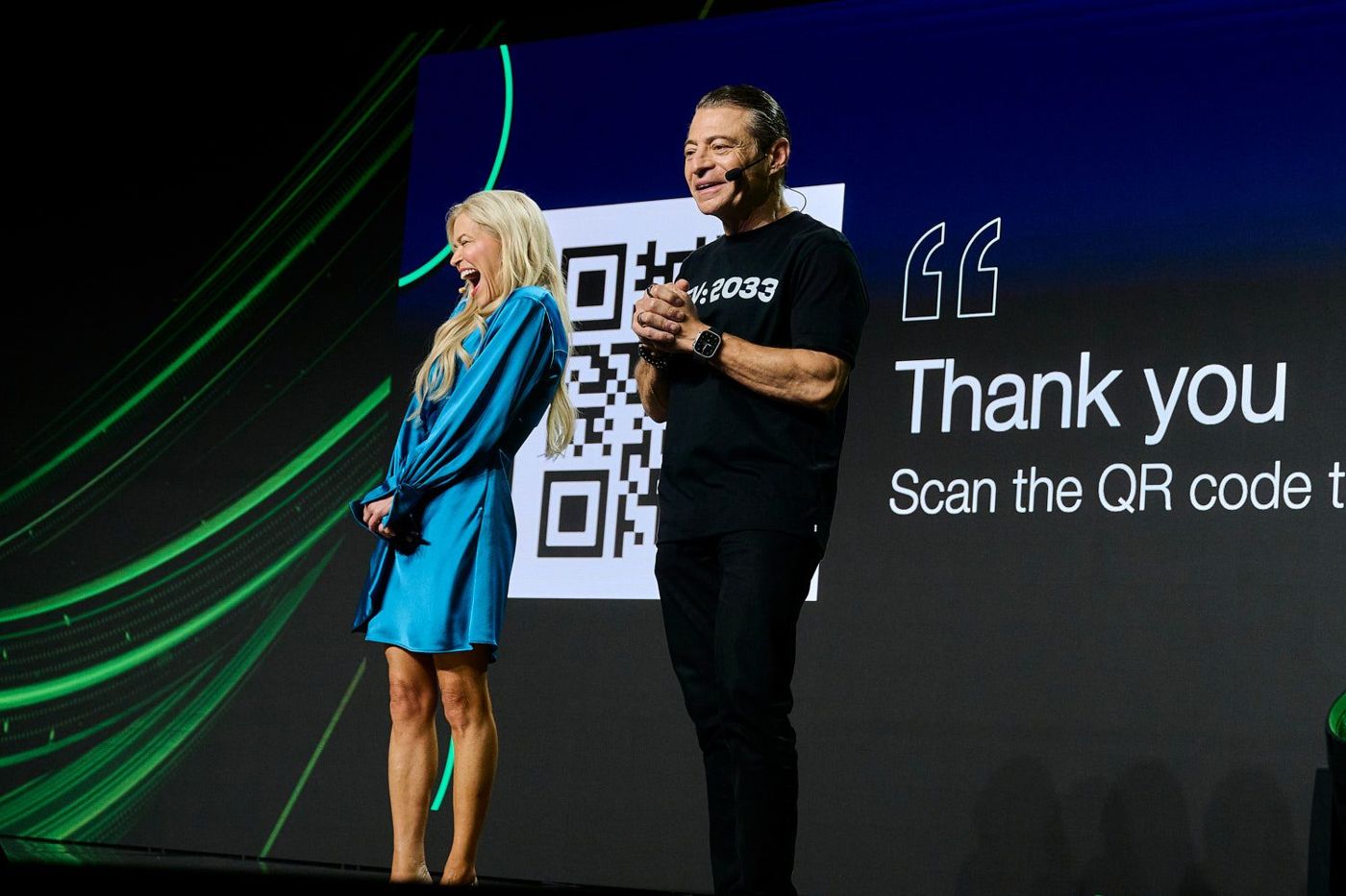 Presenters thanking the room on the main stage