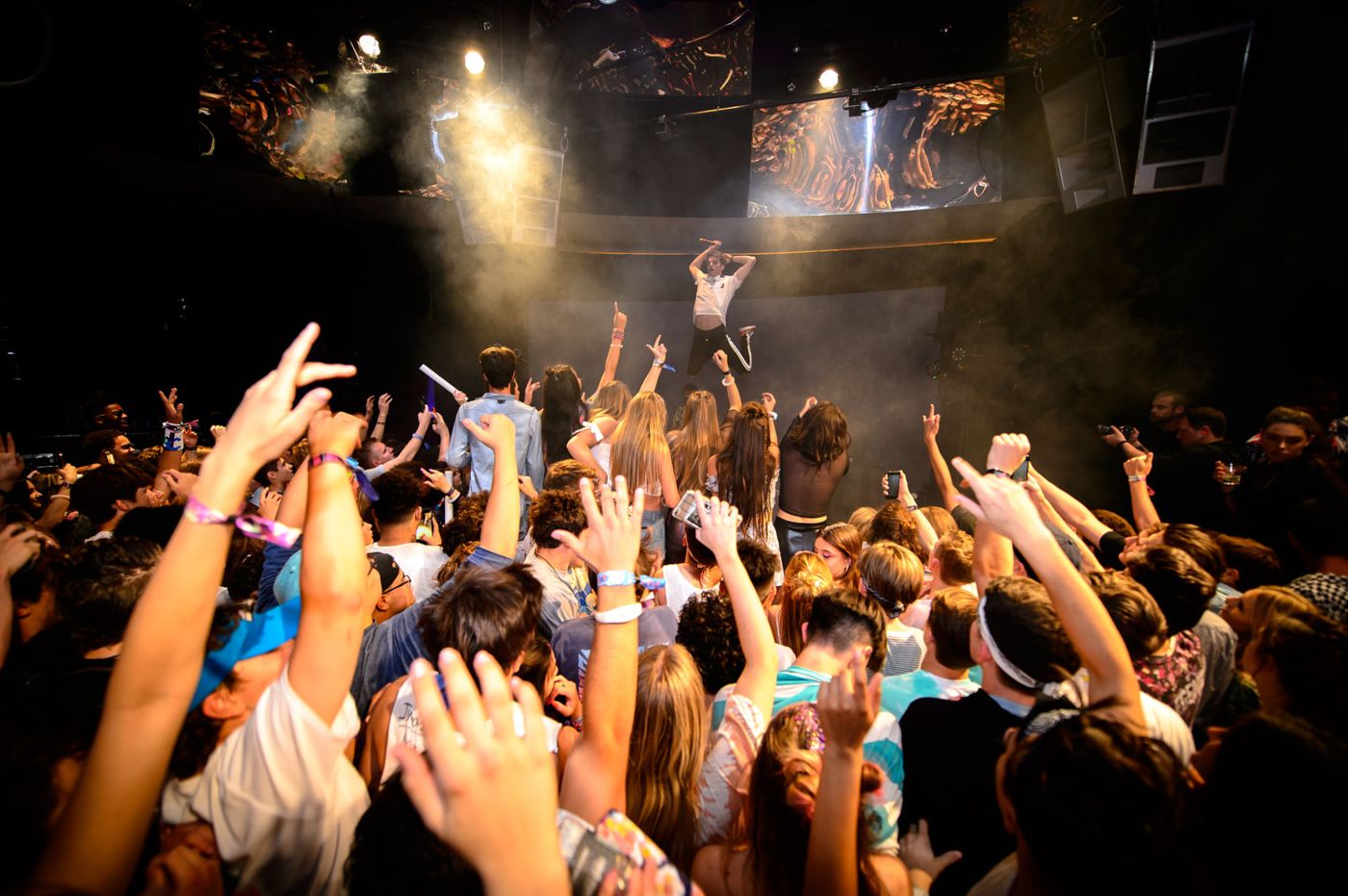 Crowd surfing at a corporate concert