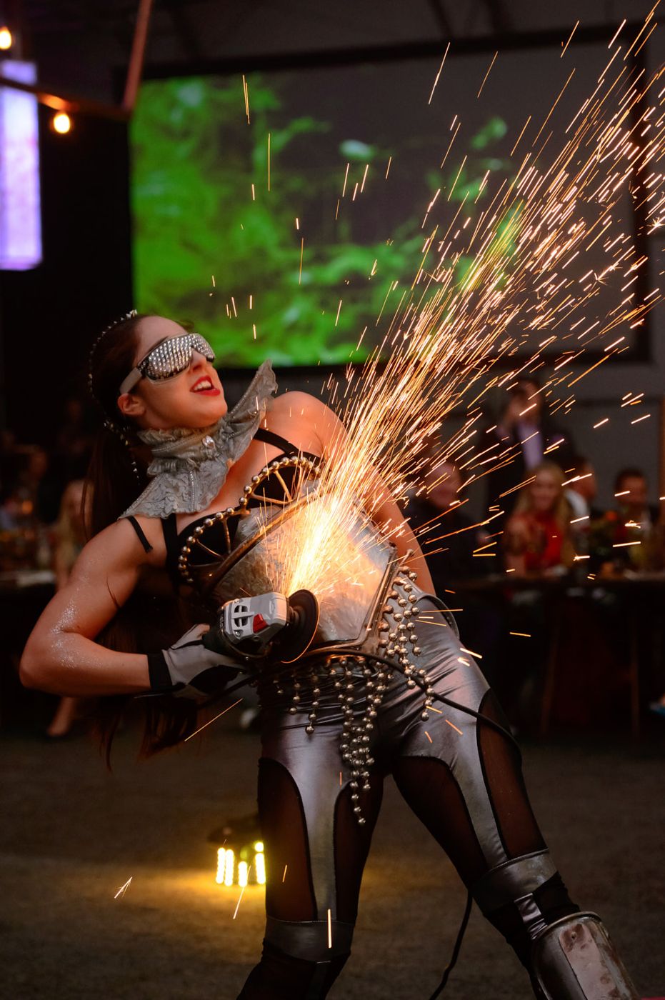 Grinder performer throwing sparks