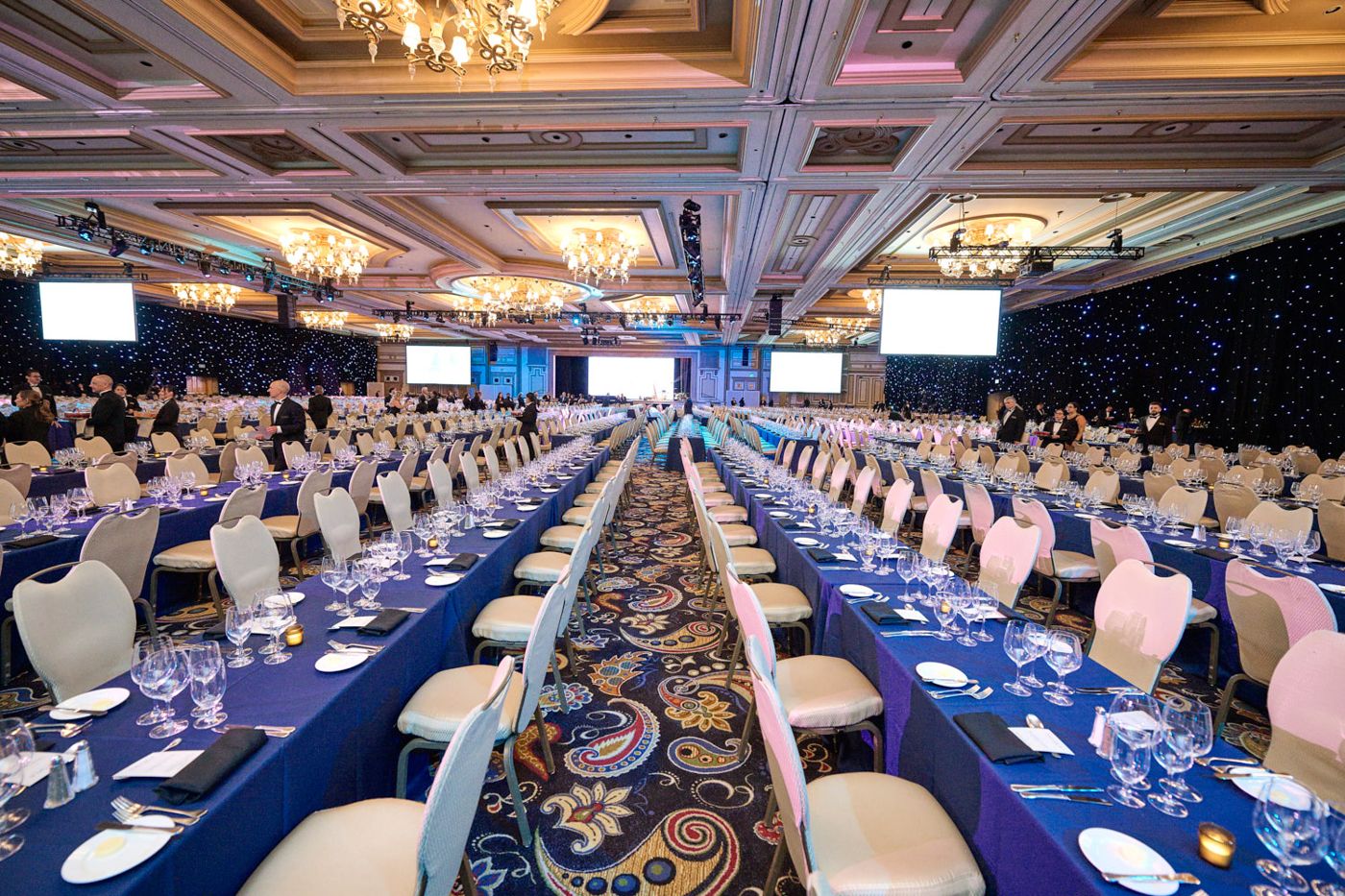 Ballroom set for an awards dinner