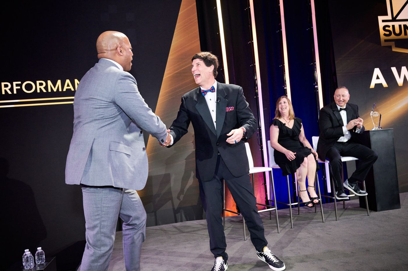 Handshake on the awards stage