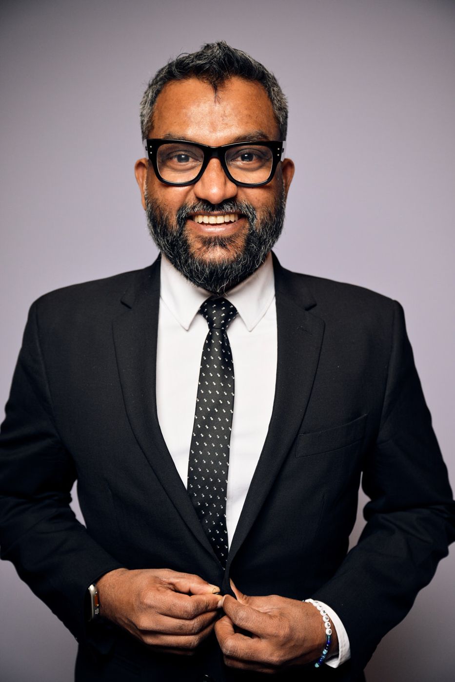 Executive portrait on a gray backdrop